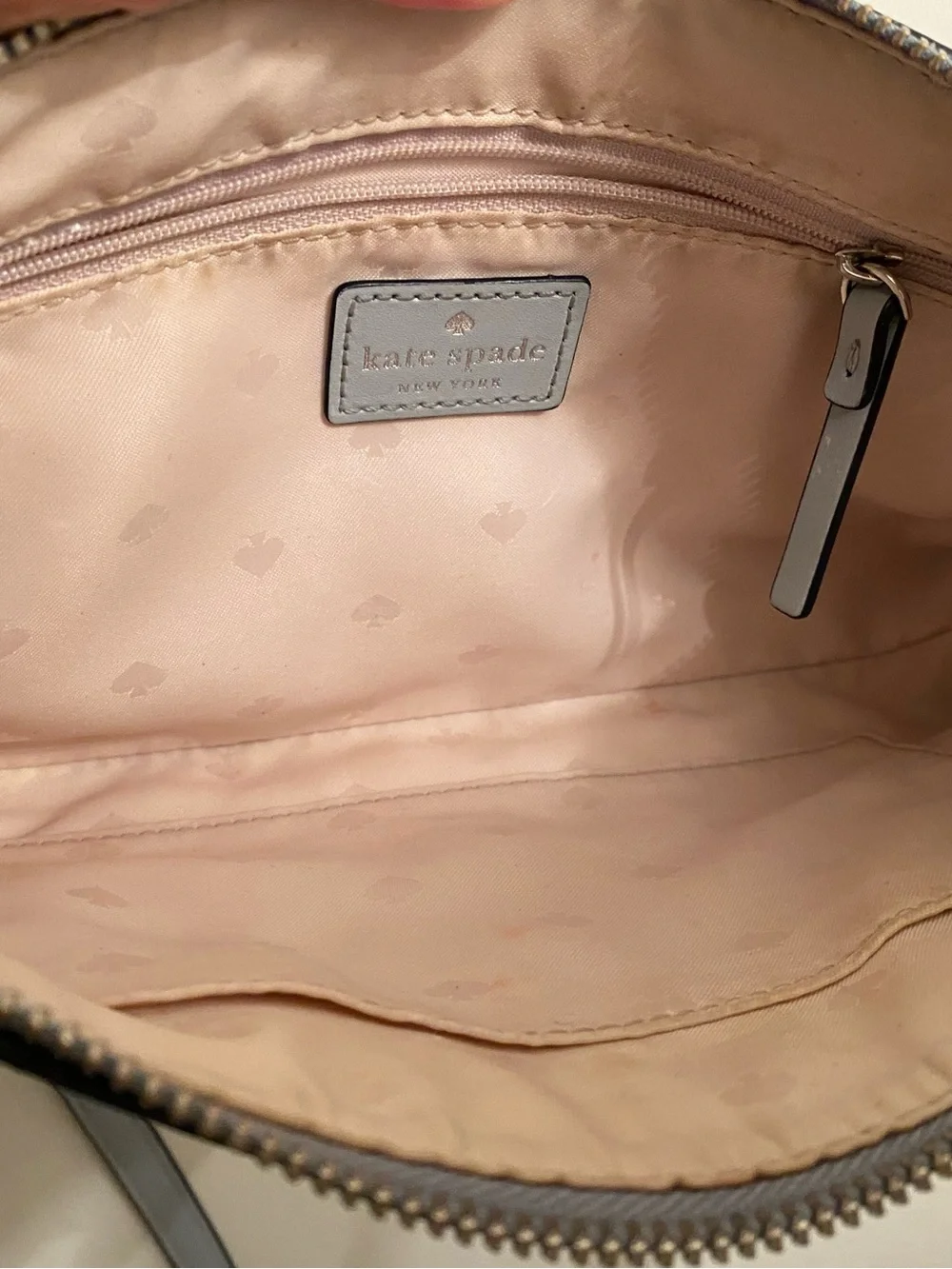 Kate Spade light gray leather crossbody bag with gold spade logo